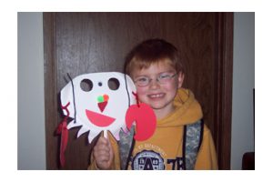 Matthew with his crab mask
