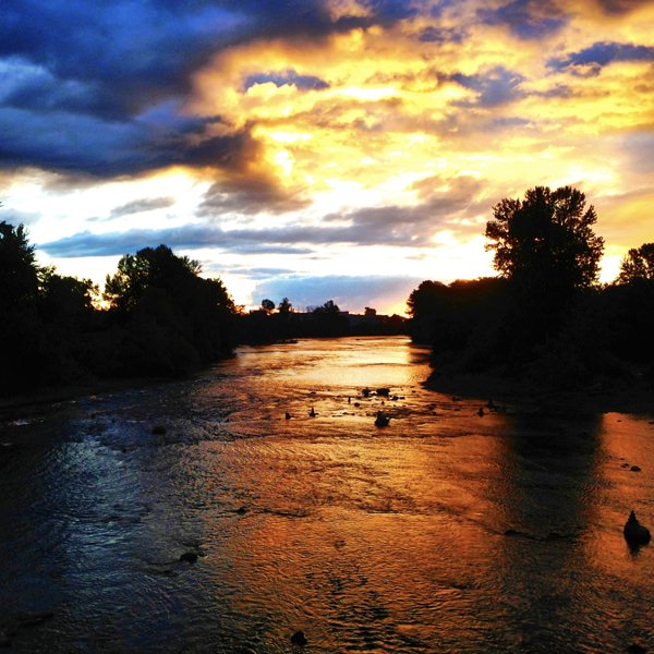 Sunset and cloud sky with trees and river