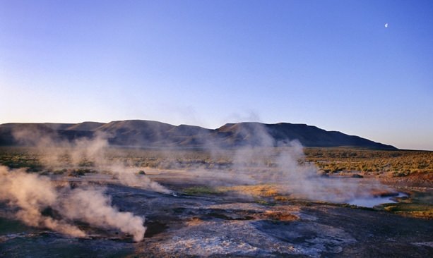 Steam rolling off the Mickey Hot Springs at dusk