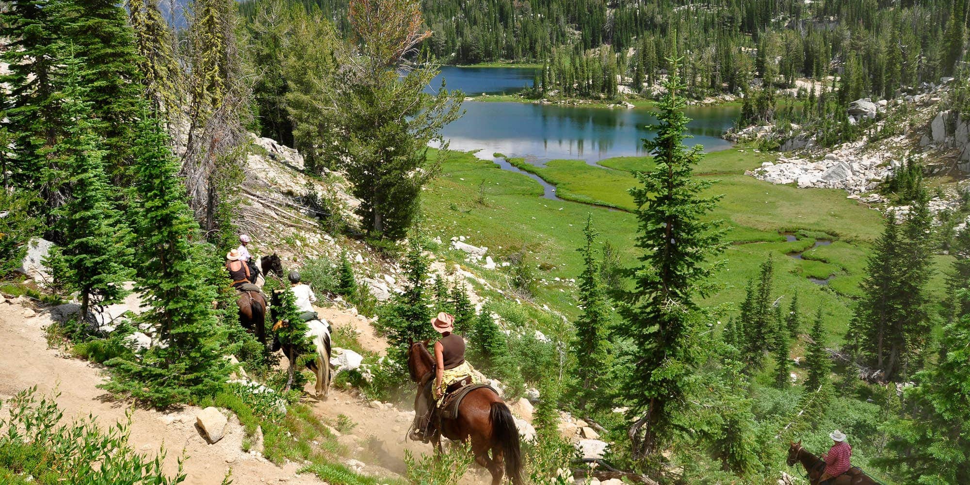 Visitors horse-pack around the lush Wallowas