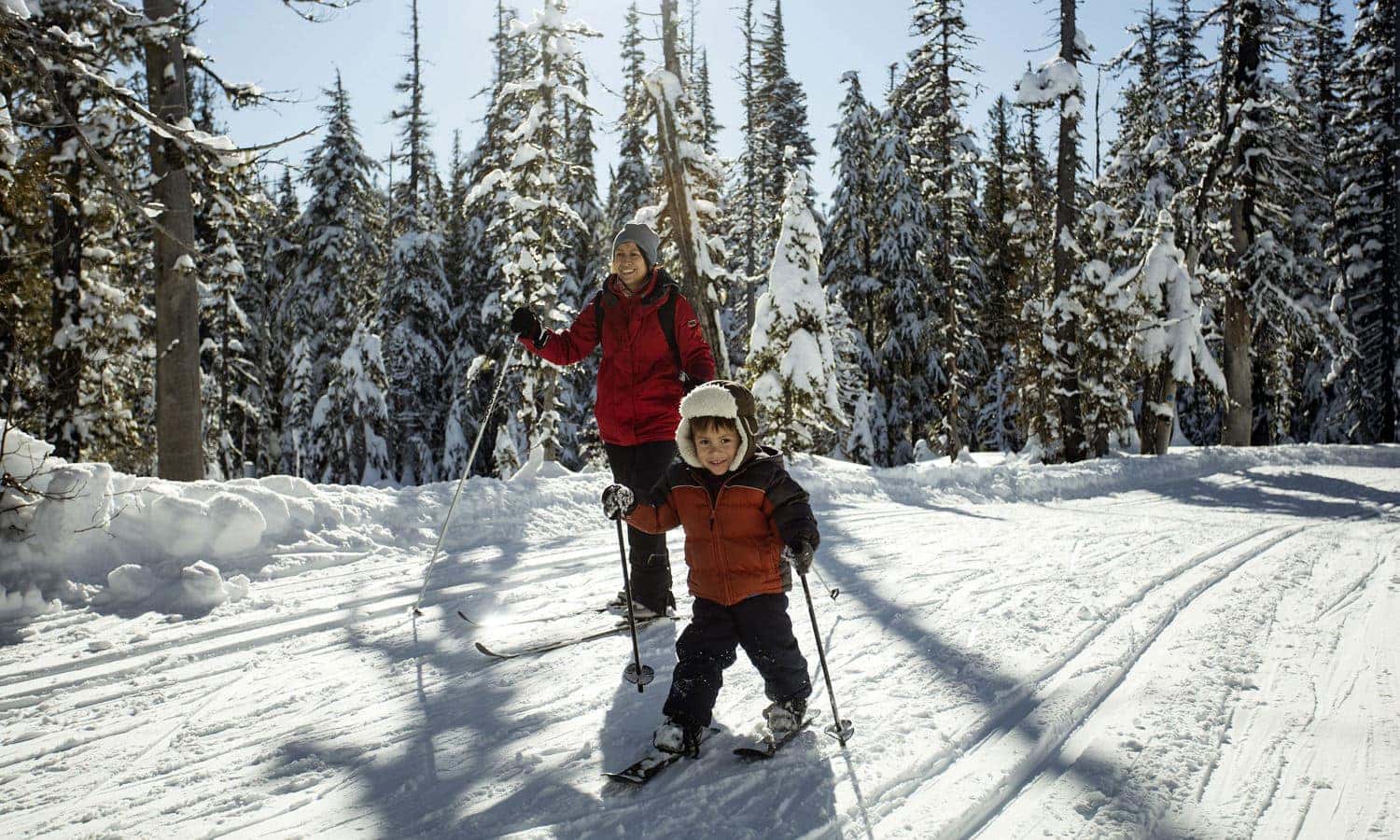 Mom and toddler cross-country skiing