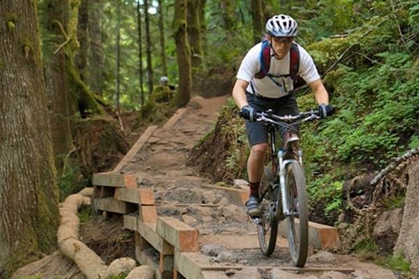 Mountain biker going downhill on Sandy Ridge Trail