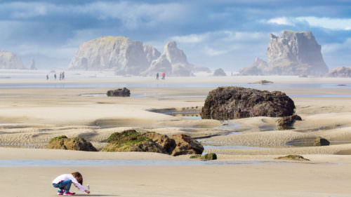 Wander the beach at Bandon, where towering rock formations and hidden agates will leave you wowed. (Photo credit: Oregon Coast Visitors Association)