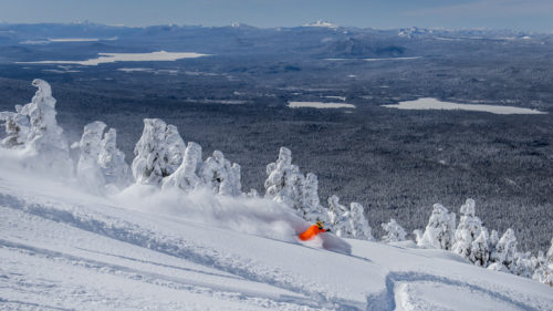 Matthias Giraud finds deep powder off the backside of Summit. (Photo: Mt. Bachelor)