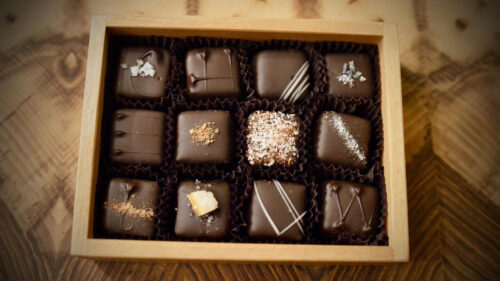 Small box containing twelve chocolates.