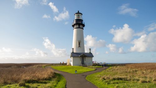 A scenic vista with a lighthouse