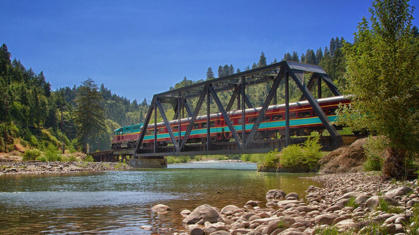 A train goes over a river