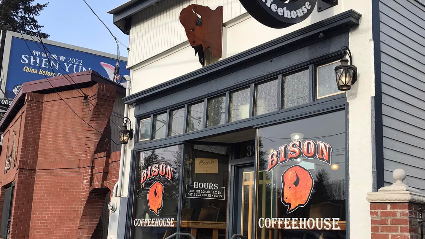 exterior of shop with Bison Coffeehouse on windows