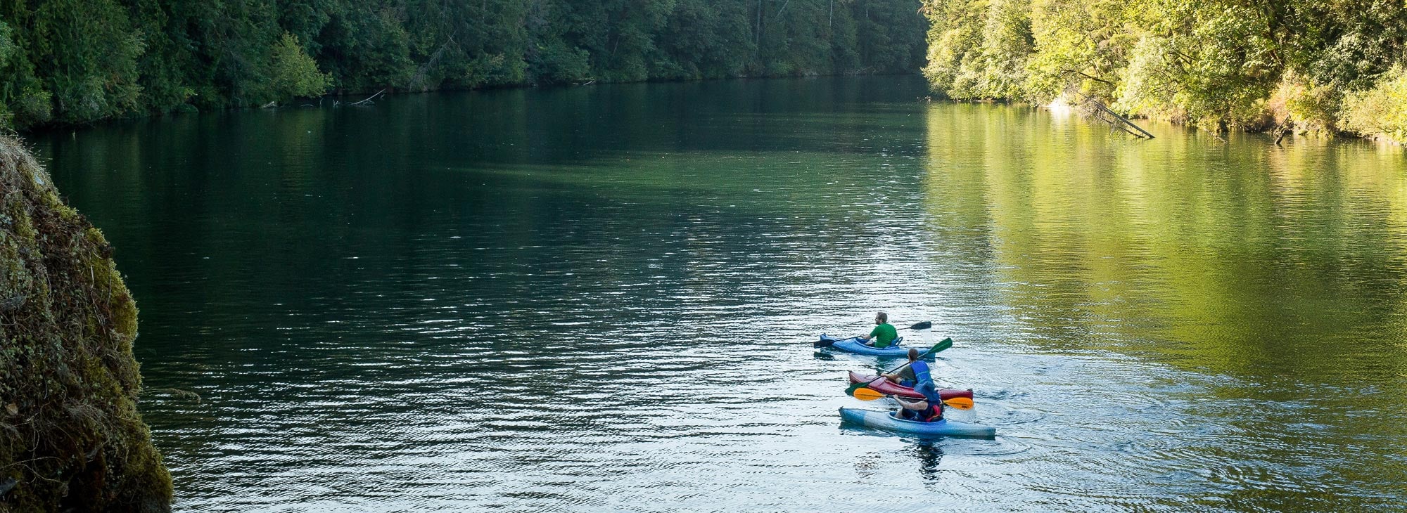 faraway shot of kayakers in water