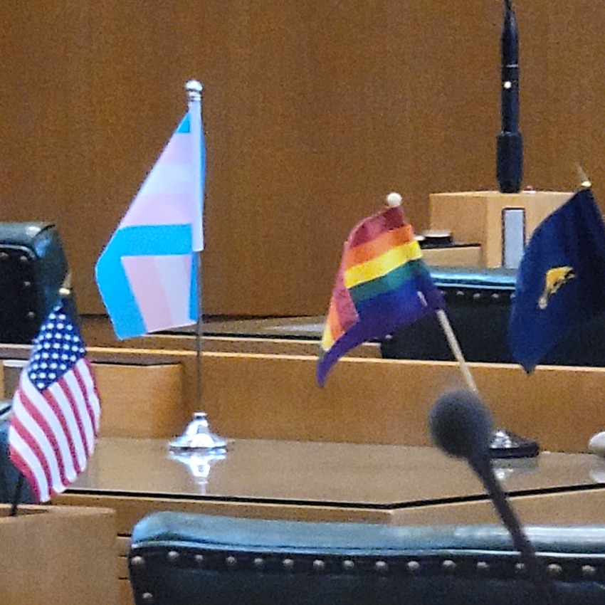 rainbow flag on wooden desk