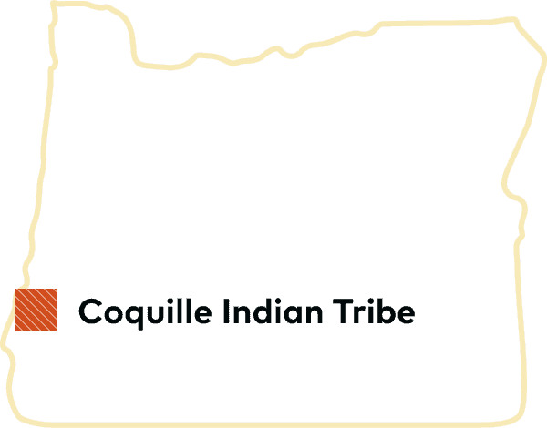 Outline of Oregon with Coquille Indian Tribe tribal land displayed.