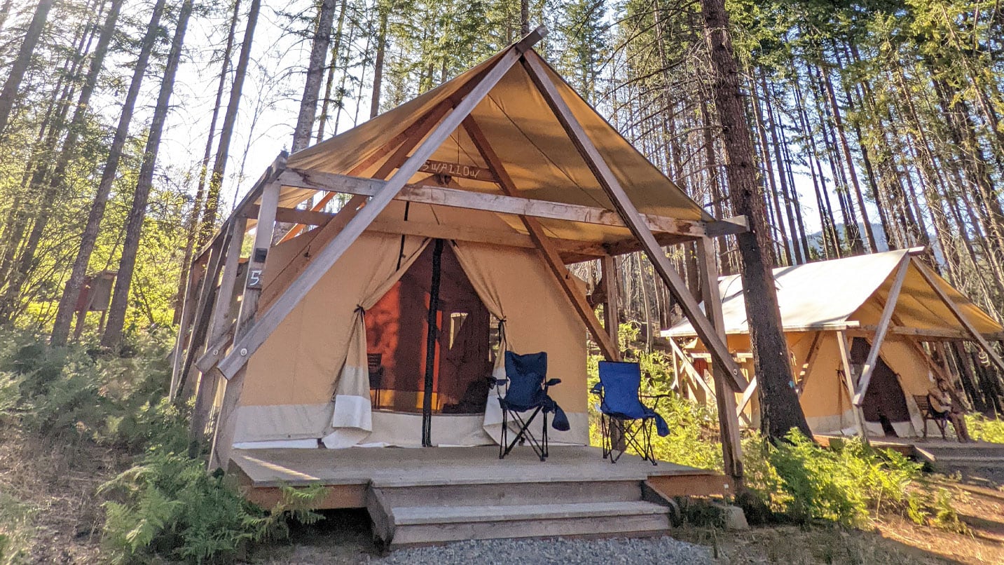 Canvas platform tents in a forest