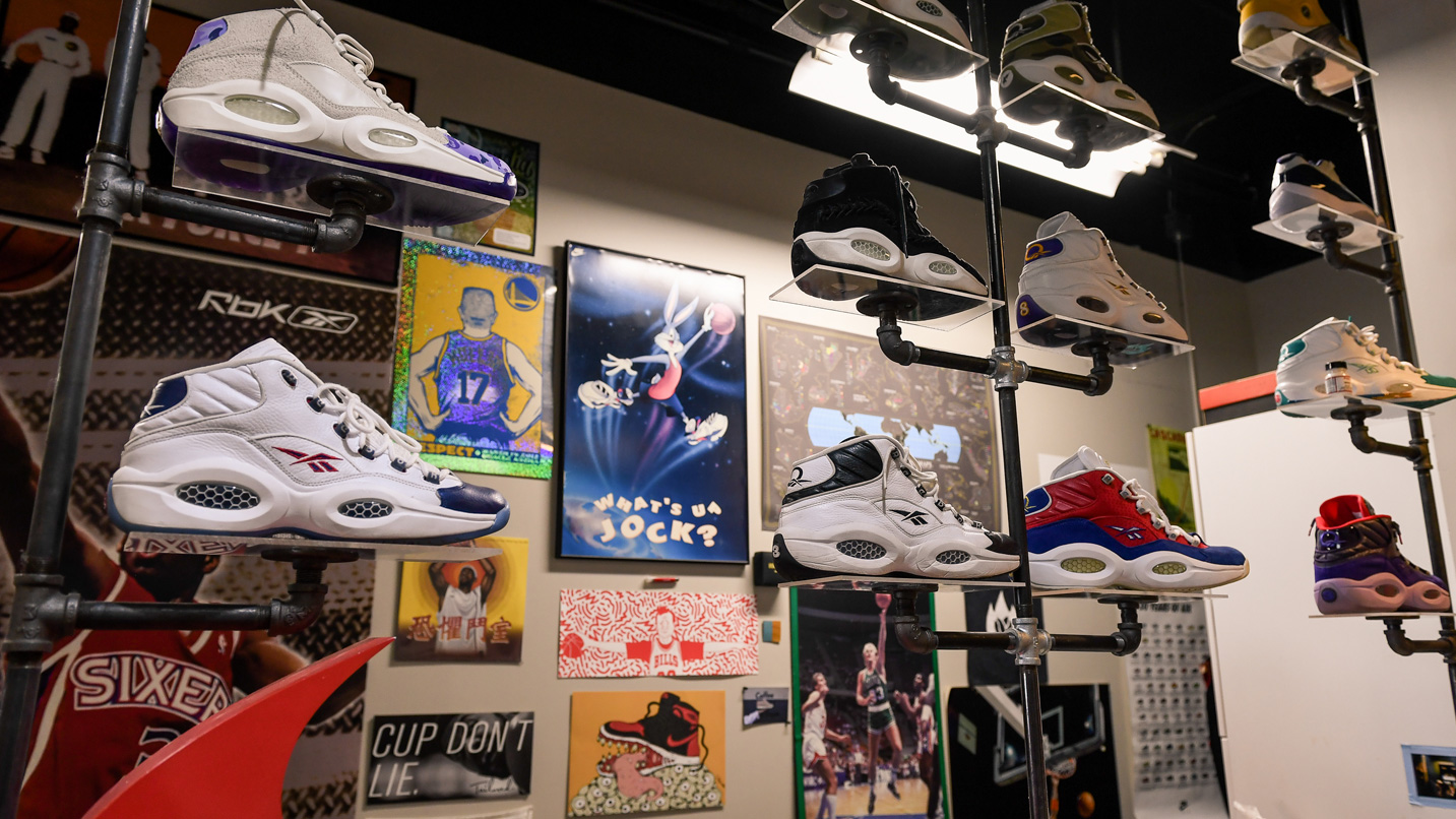 Single sneakers on display in a basketball themed coffeeshop