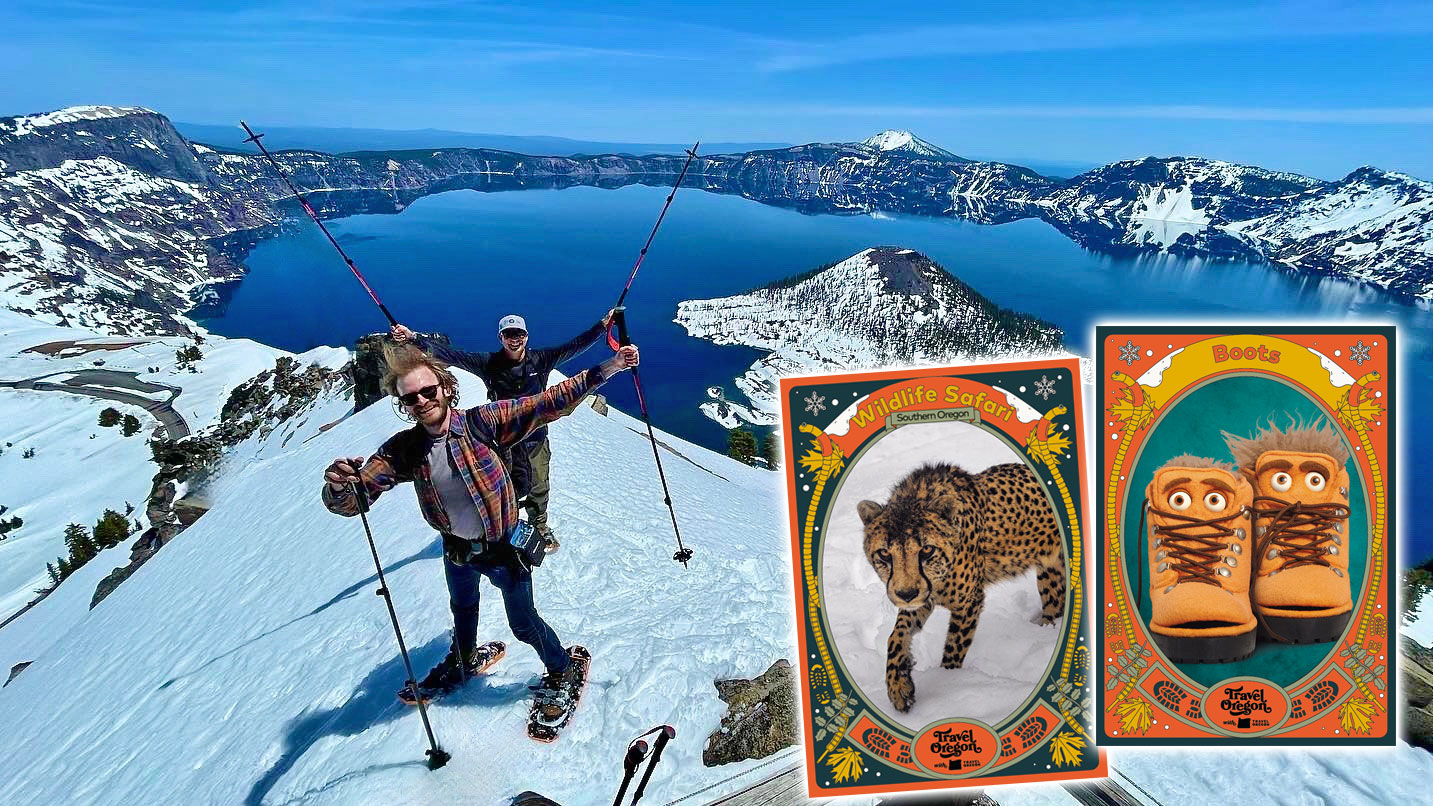 Two skiers on rim of Crater Lake raise poles. Boots trading card is displayed to the right.