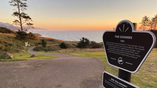 A sign marking a spot on the Oregon Film Trail at Ecola State Park, calling out a filming spot for "The Goonies."