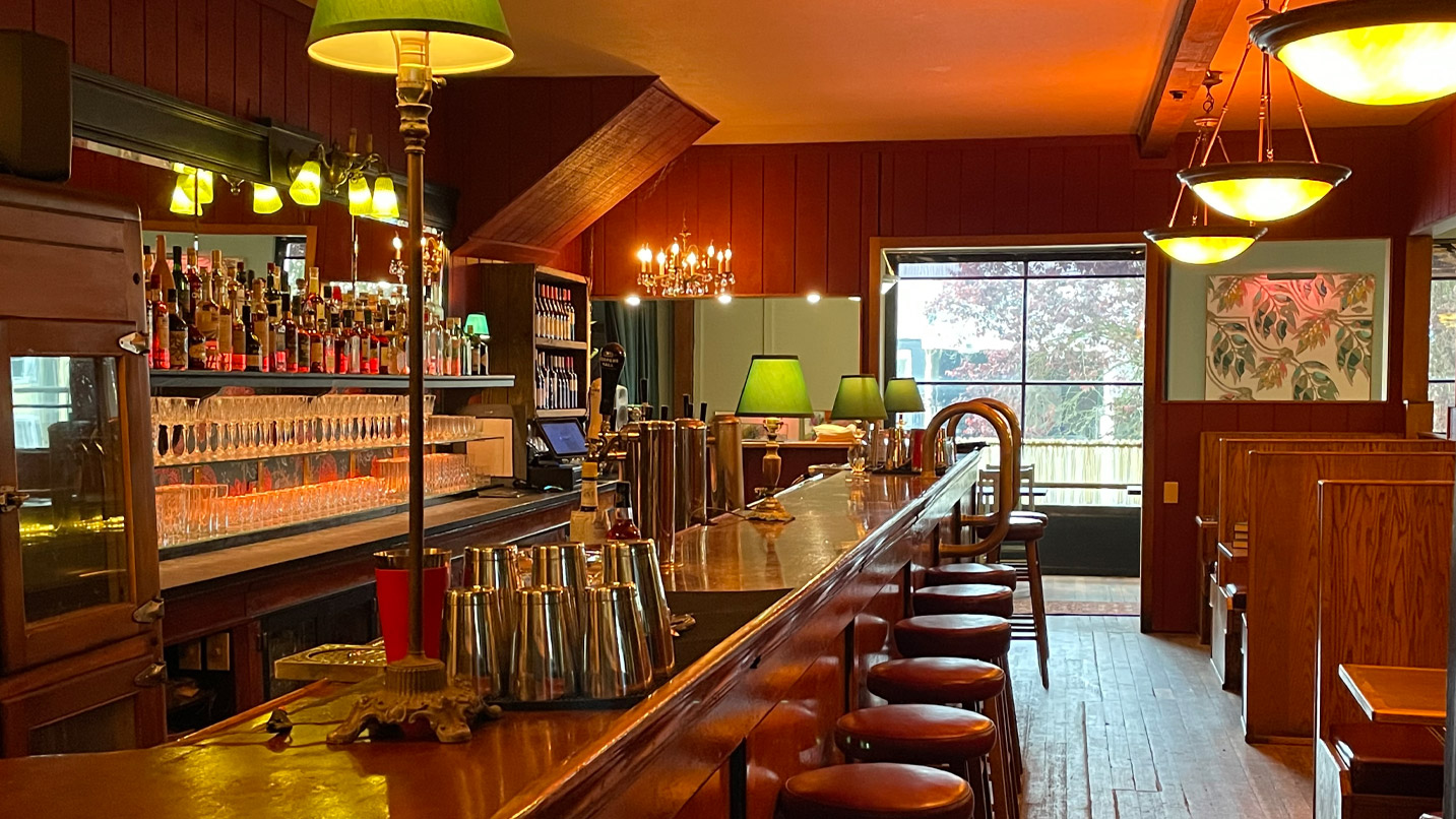 Interior of a restaurant bar with vintage decor.
