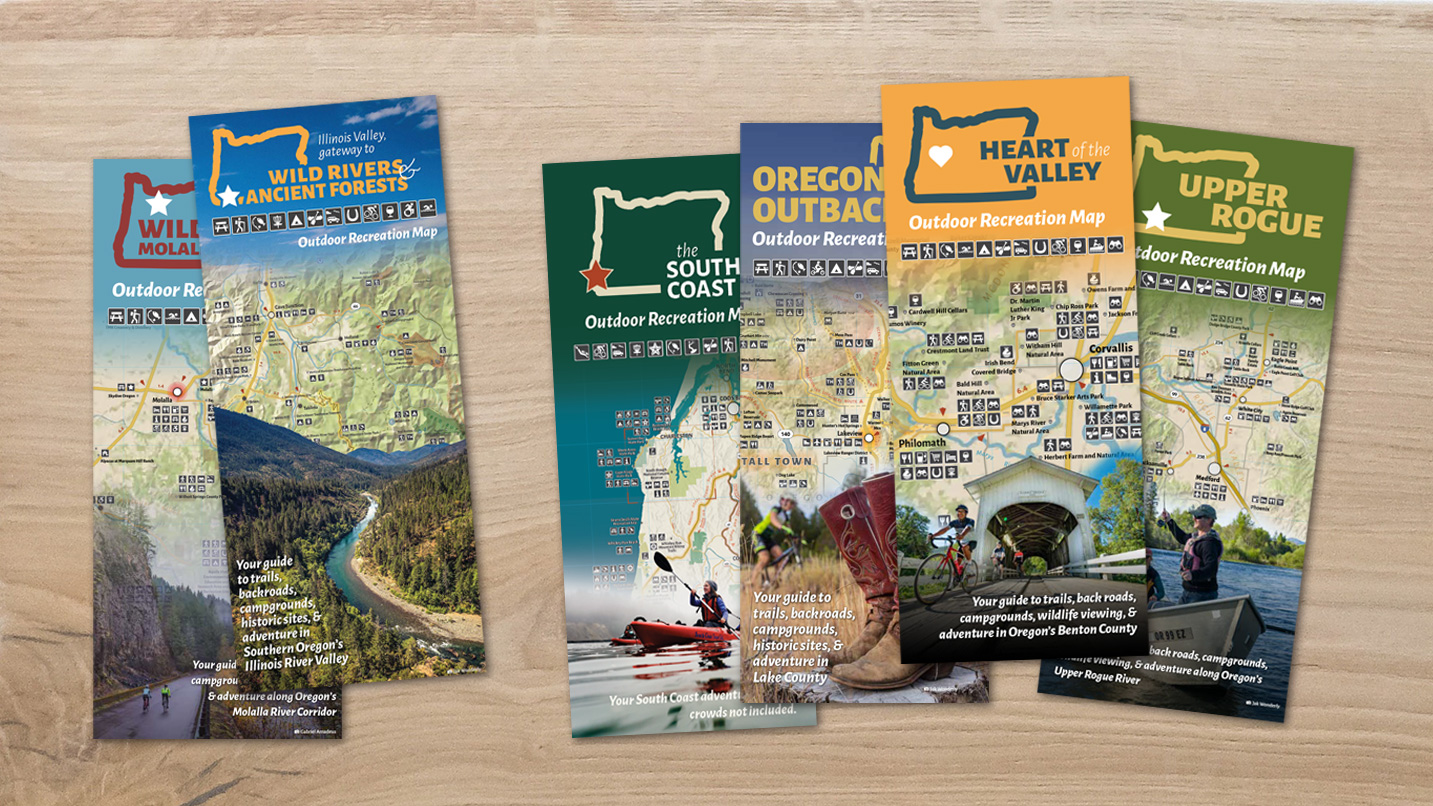 Array of colorful brochures on a wooden table