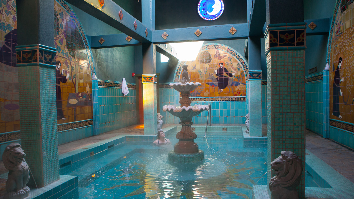 A woman in the a pool at the Old St. Francis School hotel in Bend.