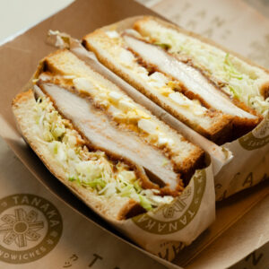 A wrapped fried chicken sandwhich.