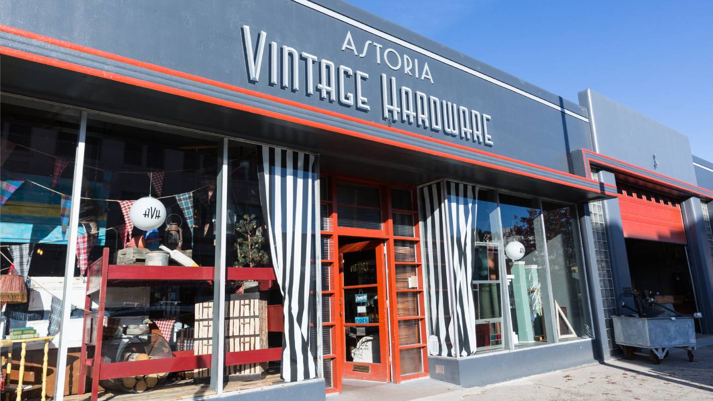 Storefront of a vintage store named Astoria Vintage Hardware.