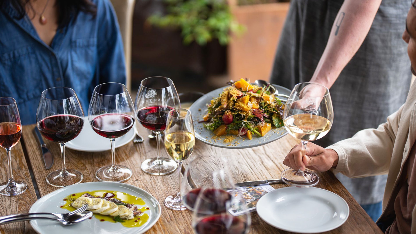 Food and wine on a table.