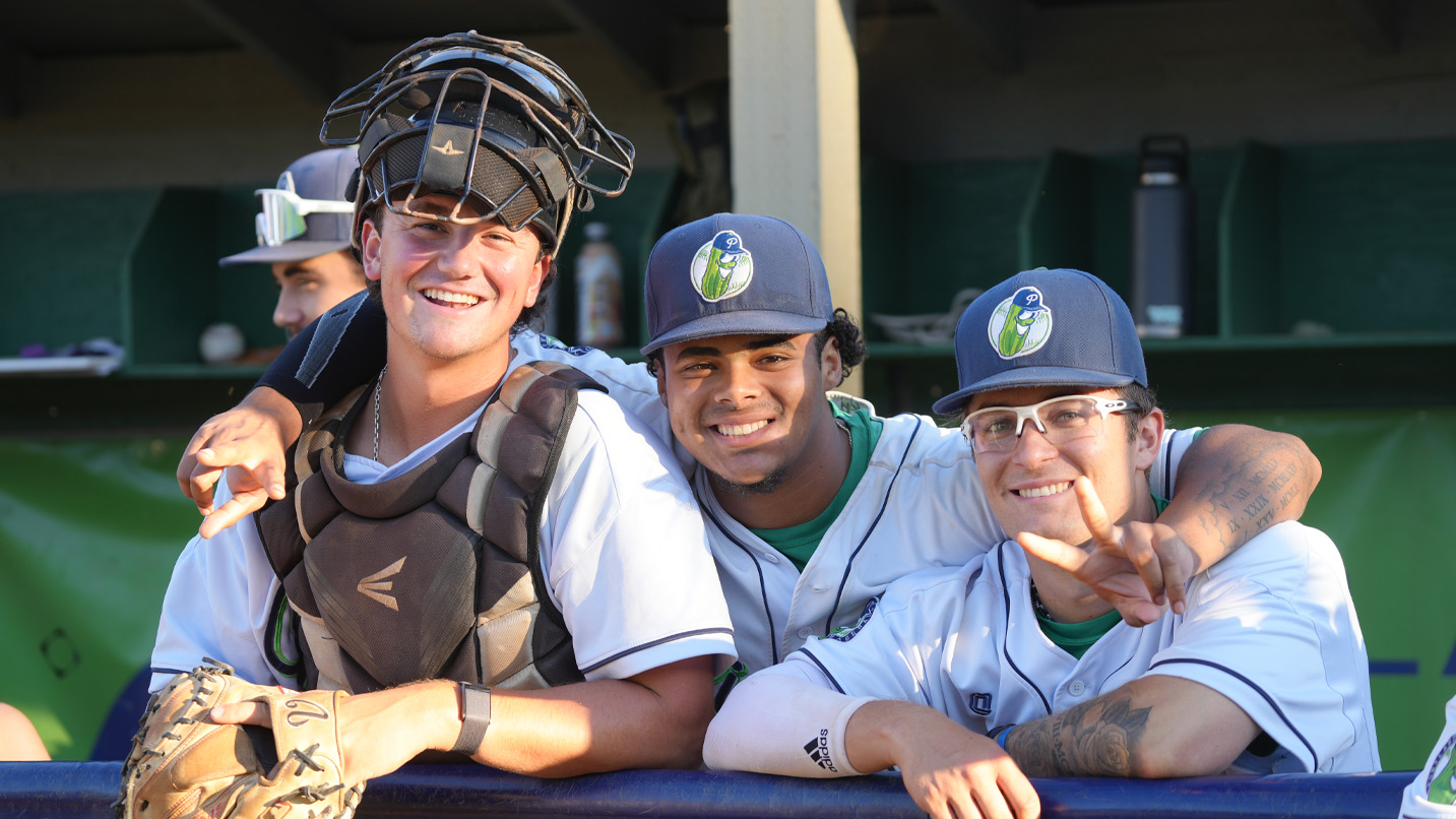 Three Portland Pickles players in uniform.