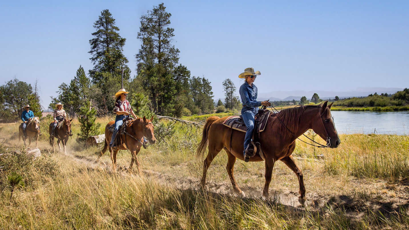 People riding horses.