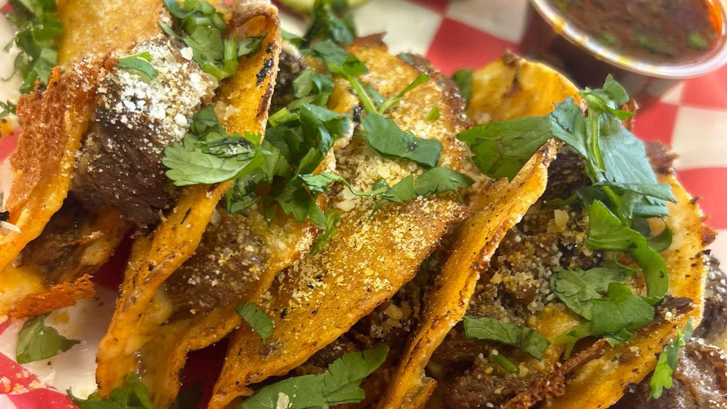 Closeup of birria tacos.