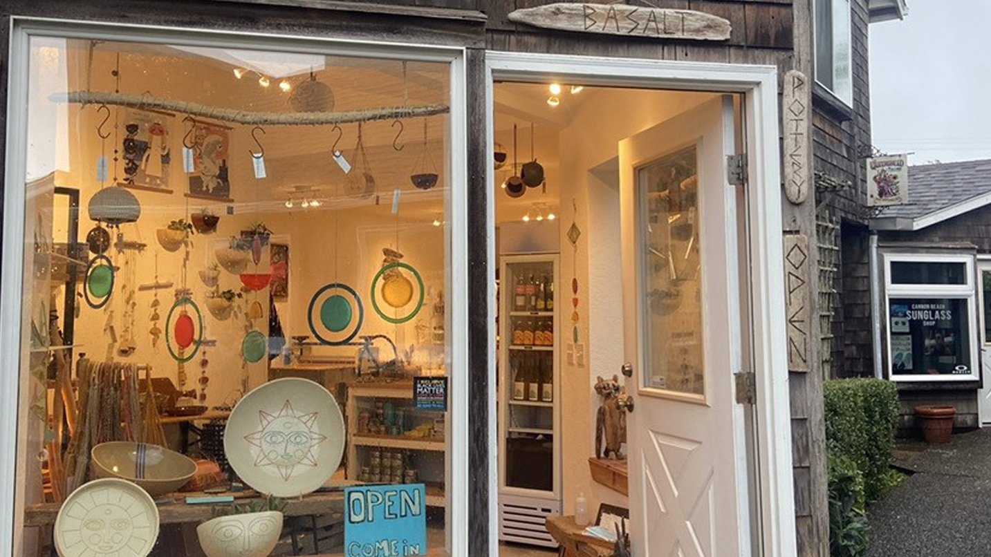 Boutique facade showcasing colorful pottery.