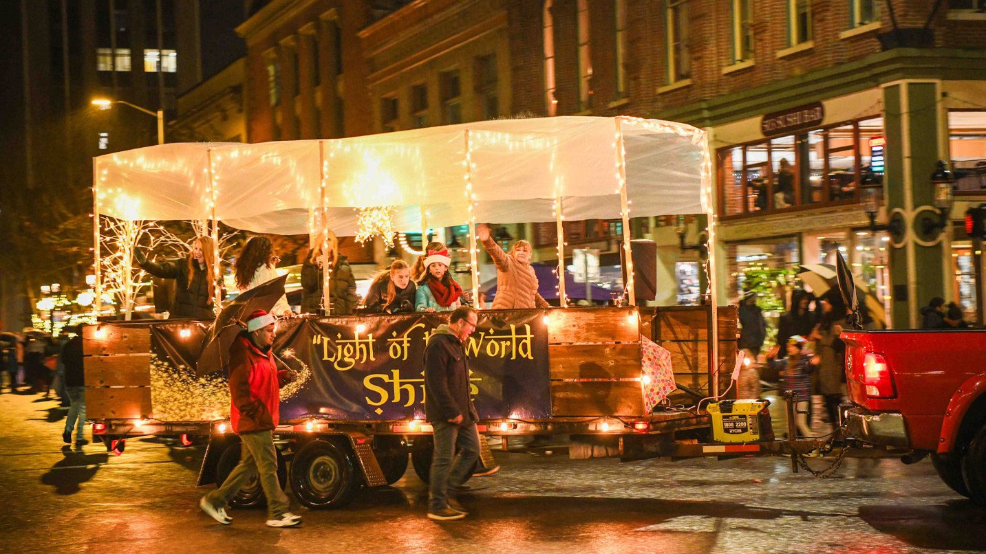 A parade of lights on a city street.