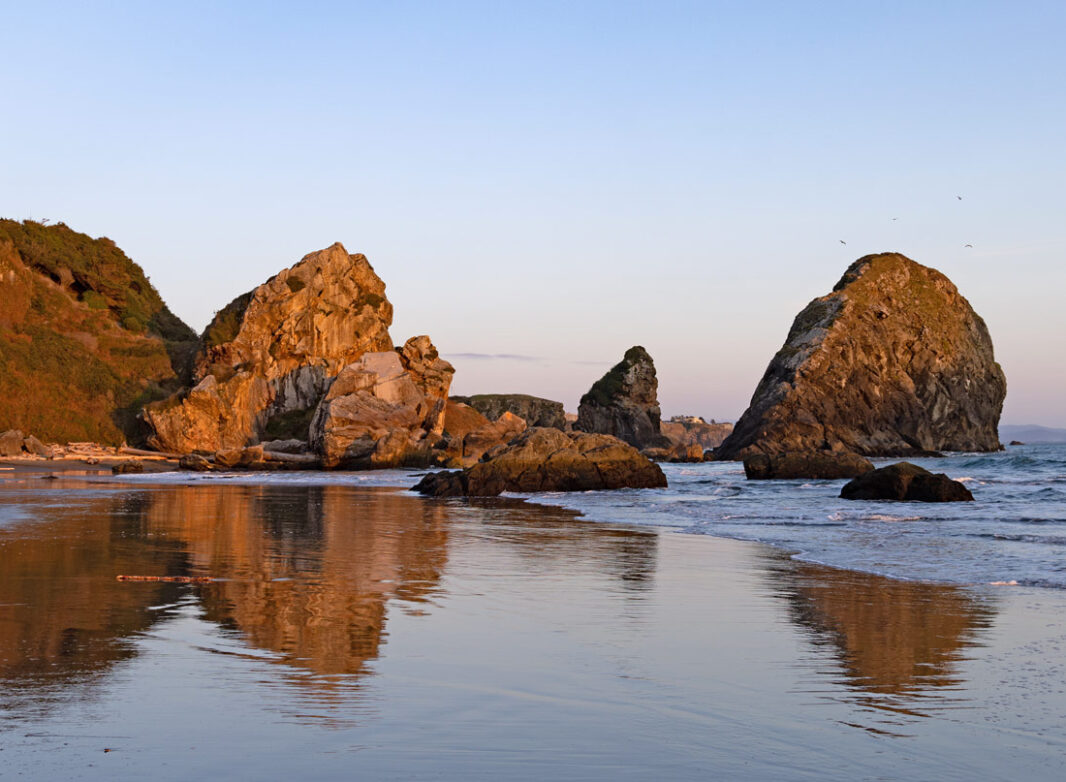 A view of craggy rocks on the beach at Port Orford, Oregon.