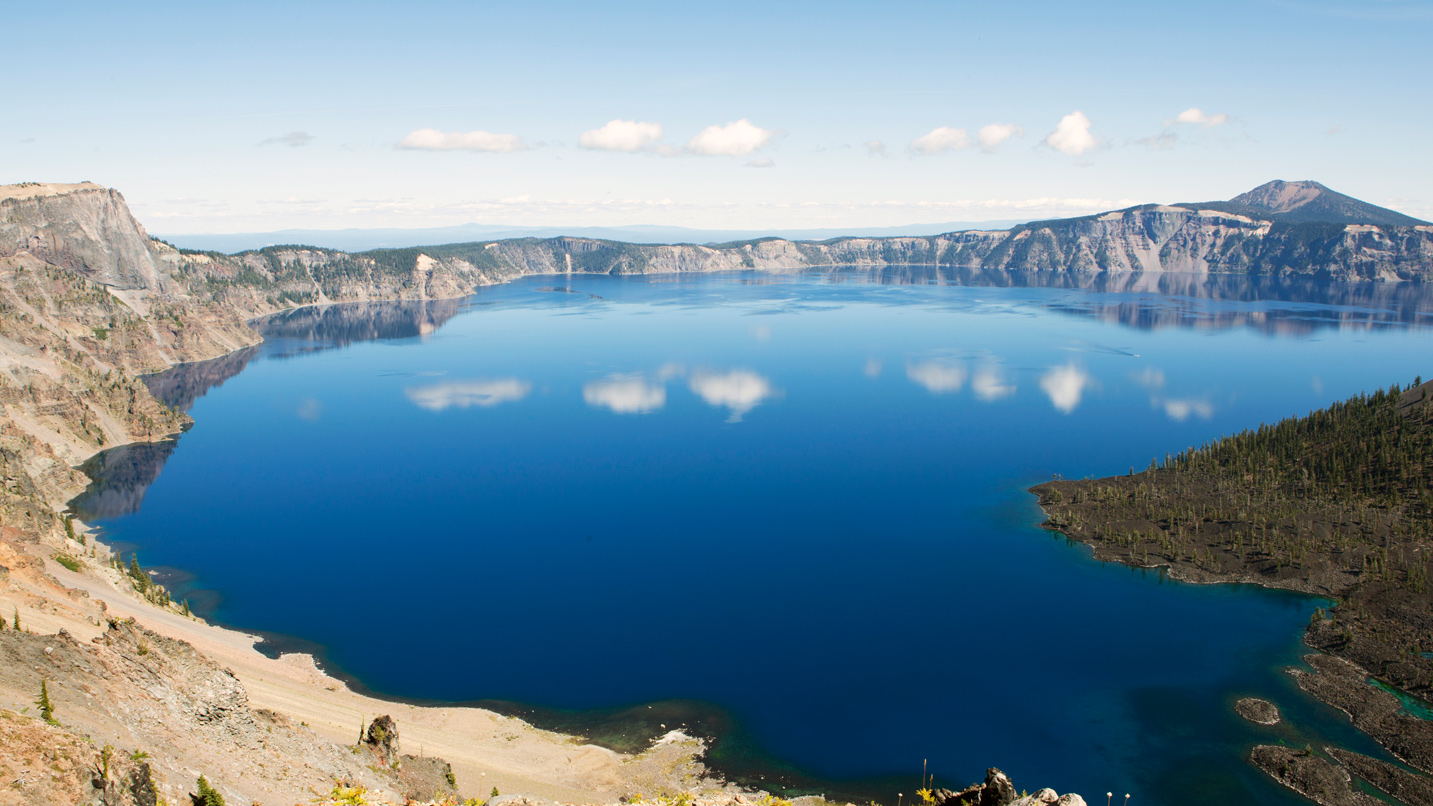 A clear blue lake in a caldera.