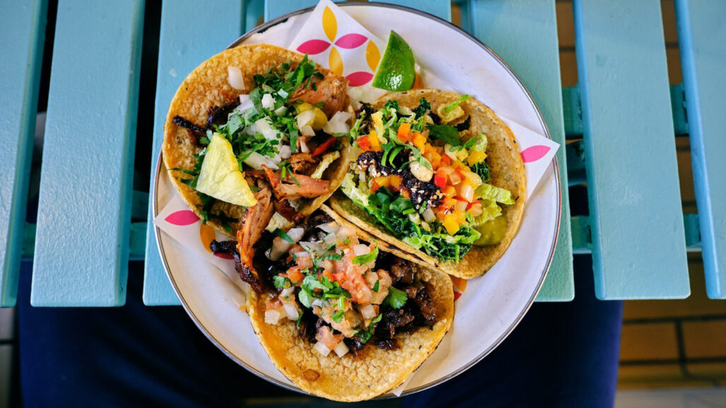 A plate of three tacos.
