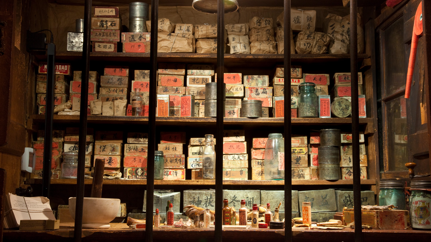 Shelves of nondescript packaged goods labeled with Chinese lettering.
